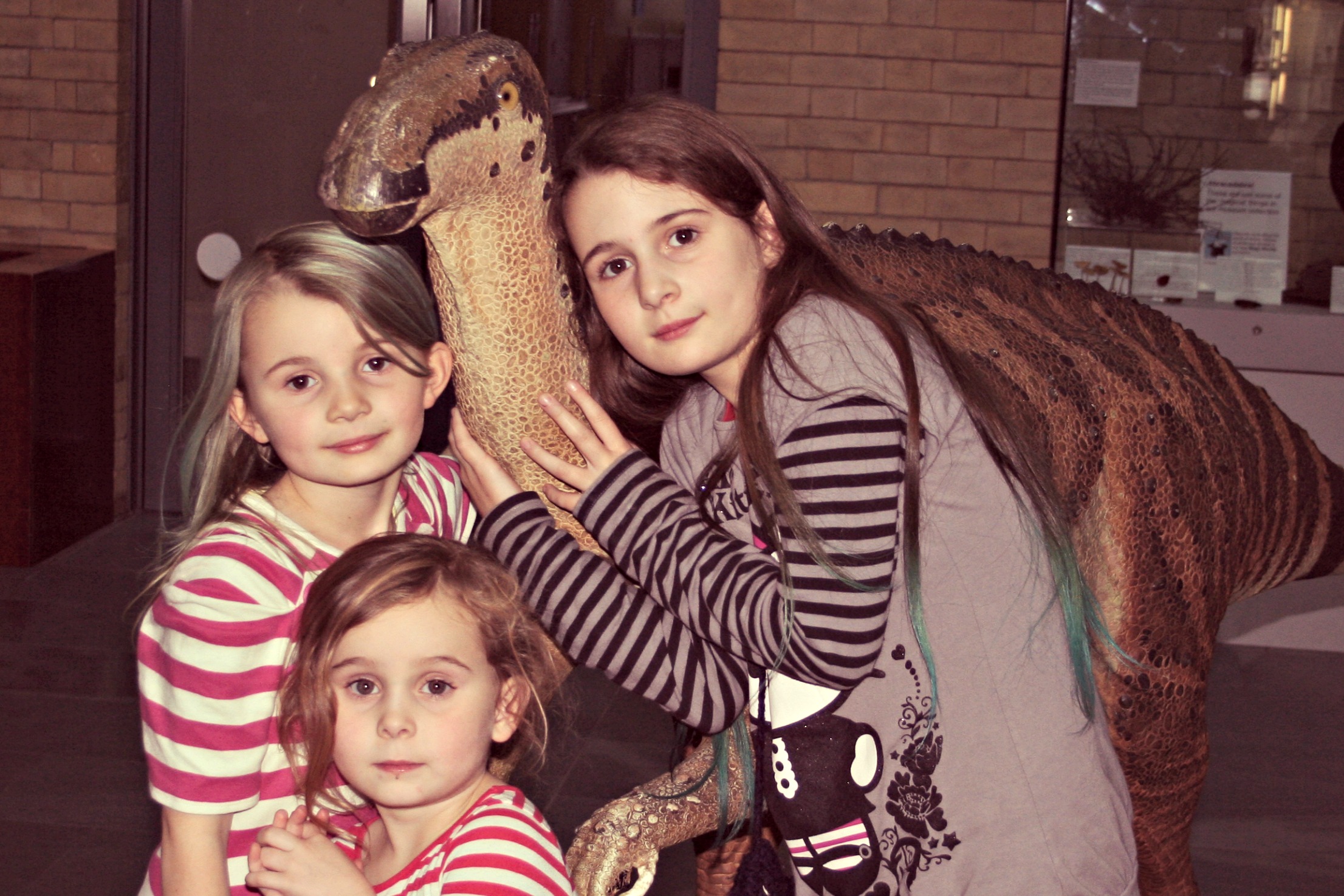 girls and a dinosaur