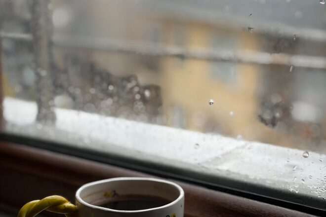 cozy rainy day with a warm coffee mug