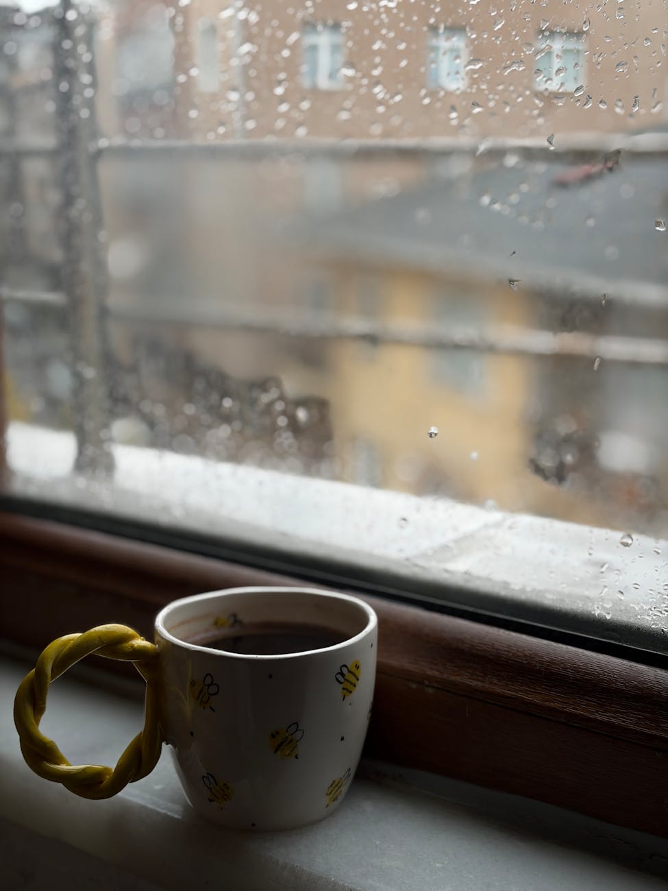 cozy rainy day with a warm coffee mug