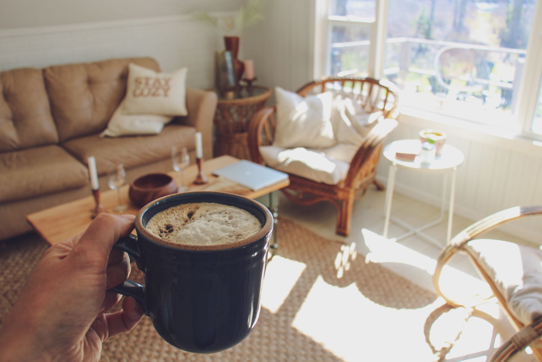 person holding a cup of coffee