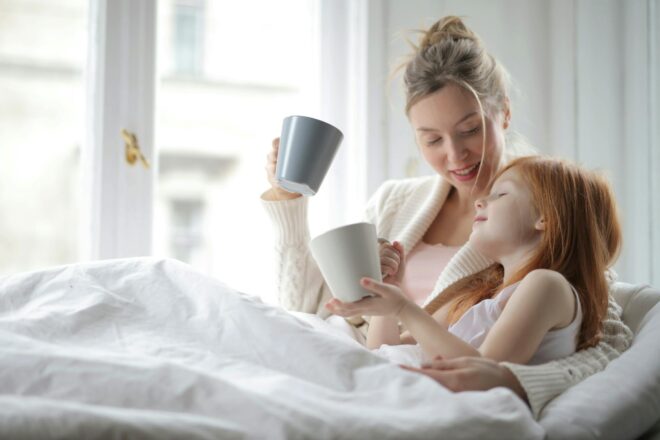 photo of people holding mug