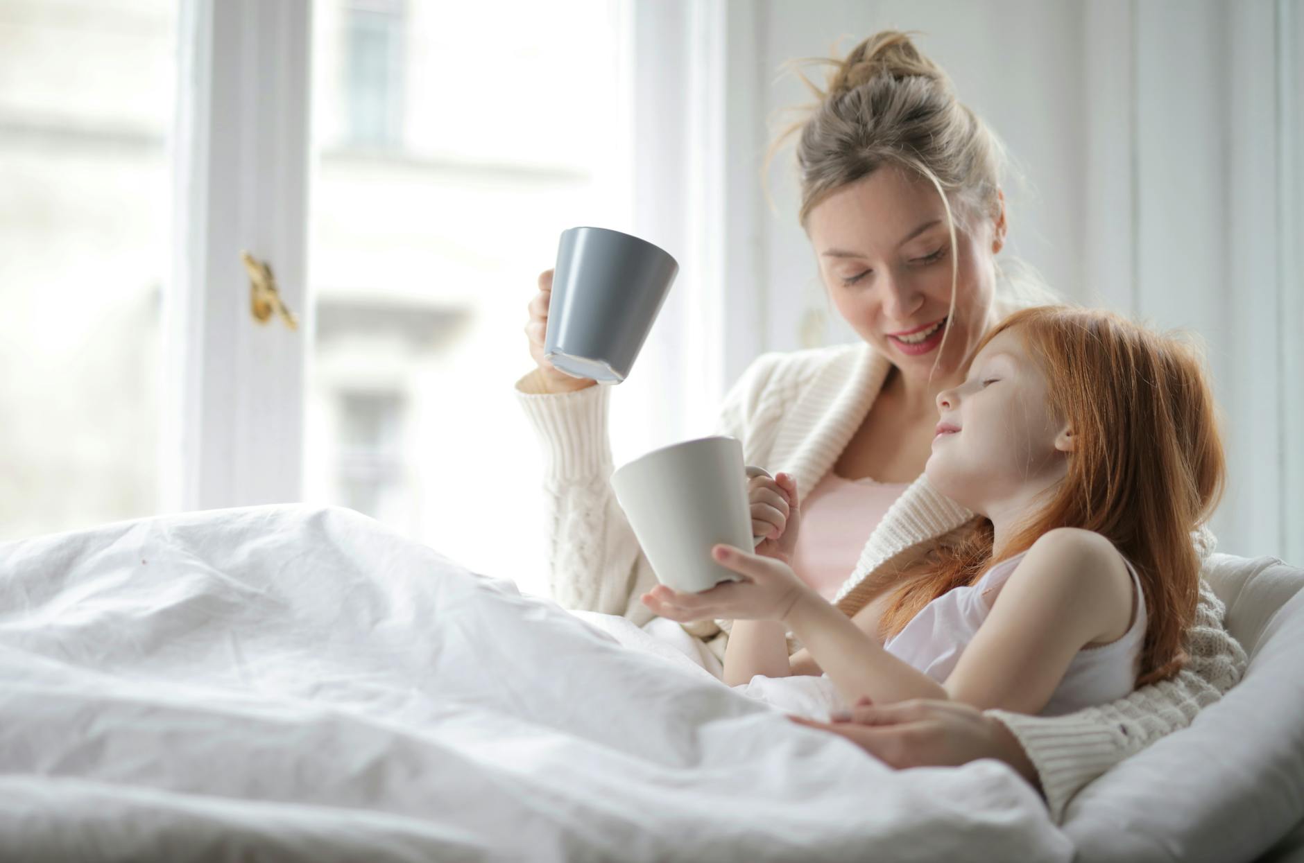 photo of people holding mug
