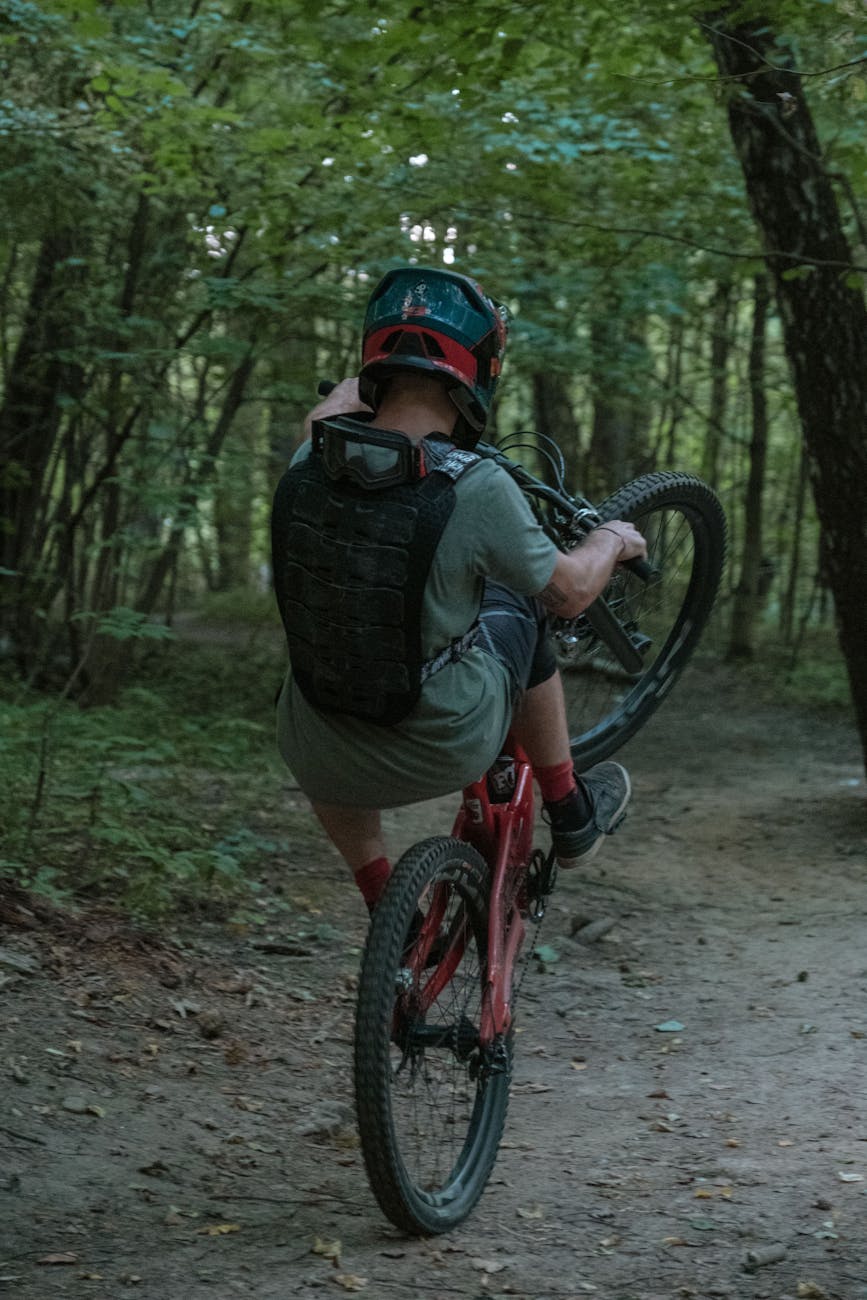 a man doing a bicycle trick