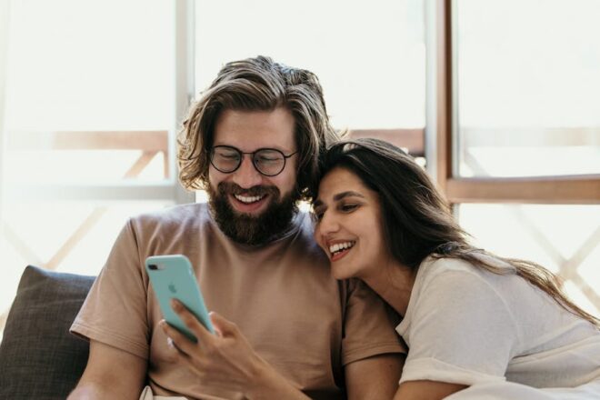 woman in brown shirt sitting beside woman in brown shirt