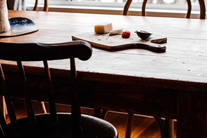 a brown wooden table with chairs